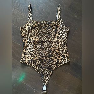 Express leopard bodysuit size M. Never worn perfect condition